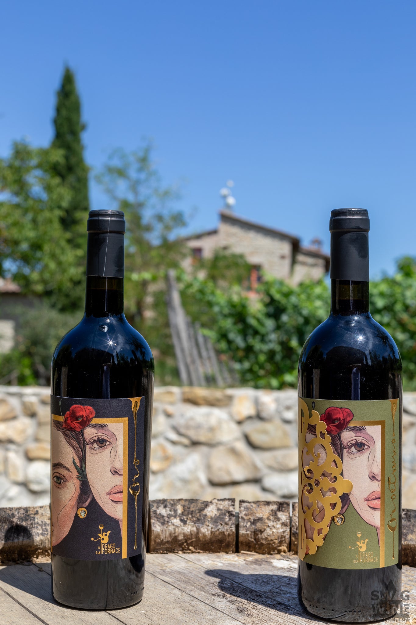 Oro Rosso Il Drago e la Fornace Sangiovese Toskana zwei halbe Frauengesichter mit Mohnblume Swagwine Rotwein Etrusco